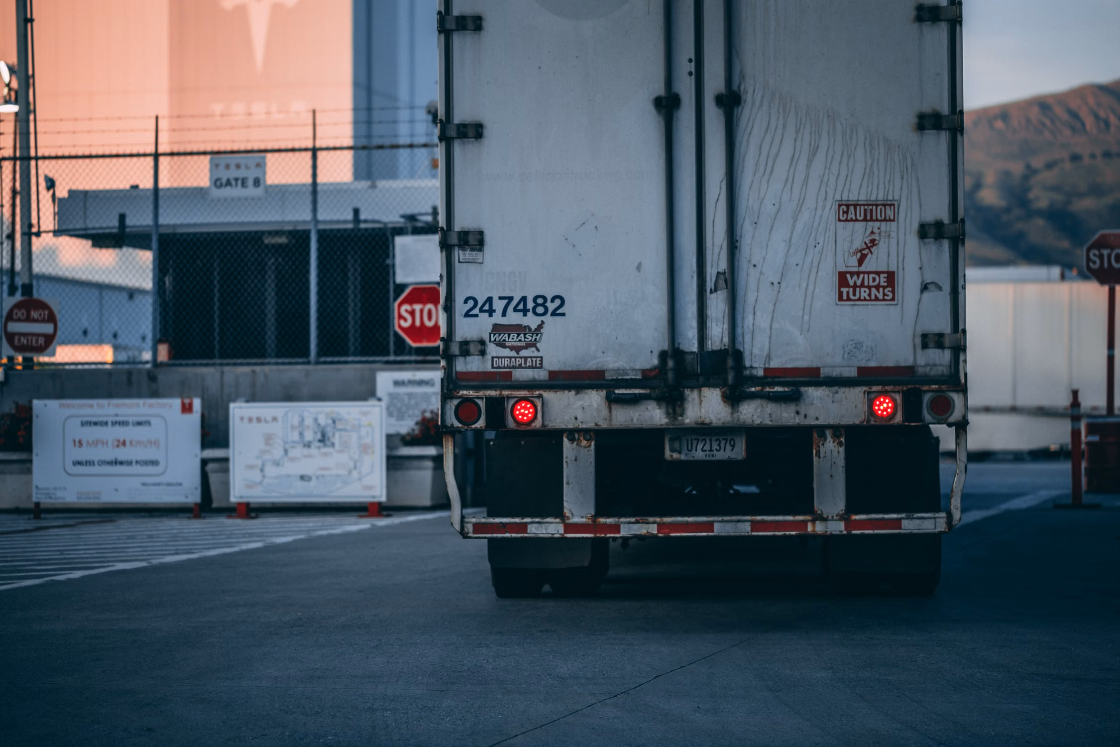Freight trailer positioned at a warehouse loading dock